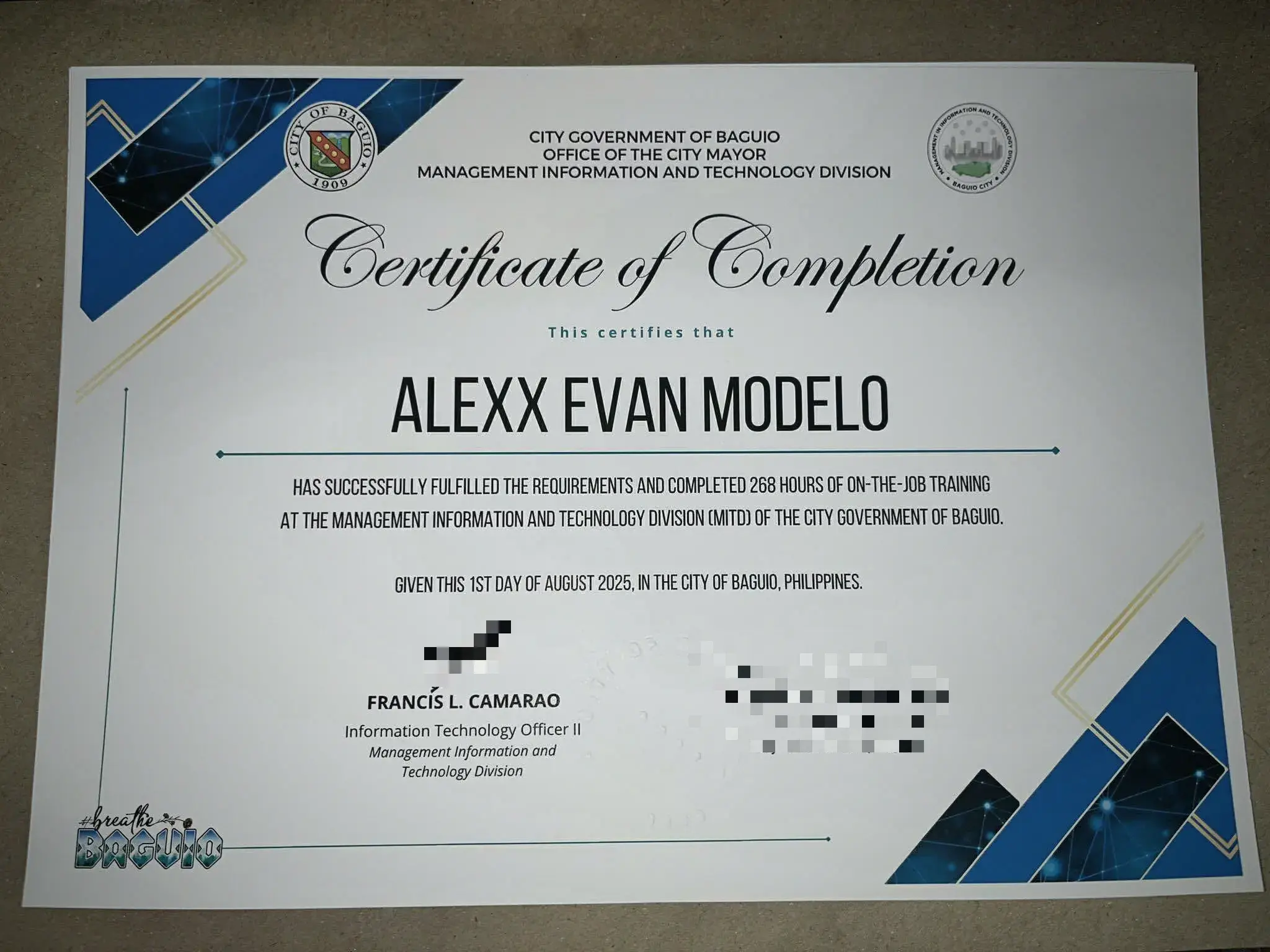 A City Government of Baguio certificate of completion for 268 hours of on-the-job training at the MITD