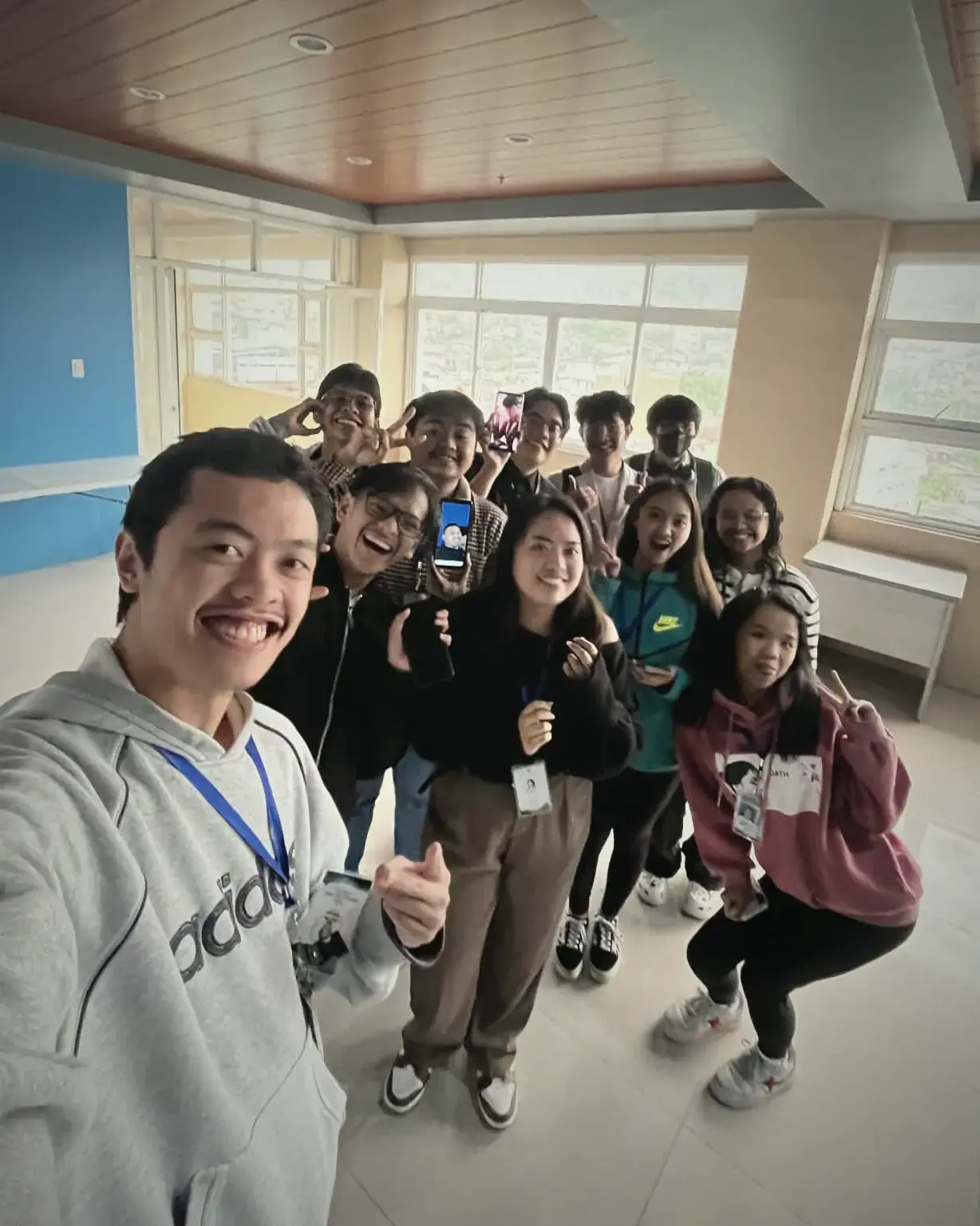 The intern cohort crowded into a group photo in a city office